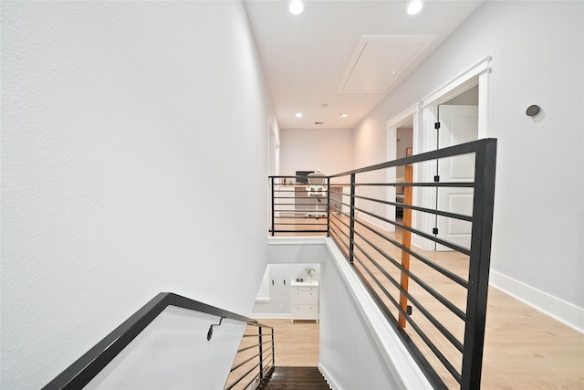 staircase featuring hardwood / wood-style flooring