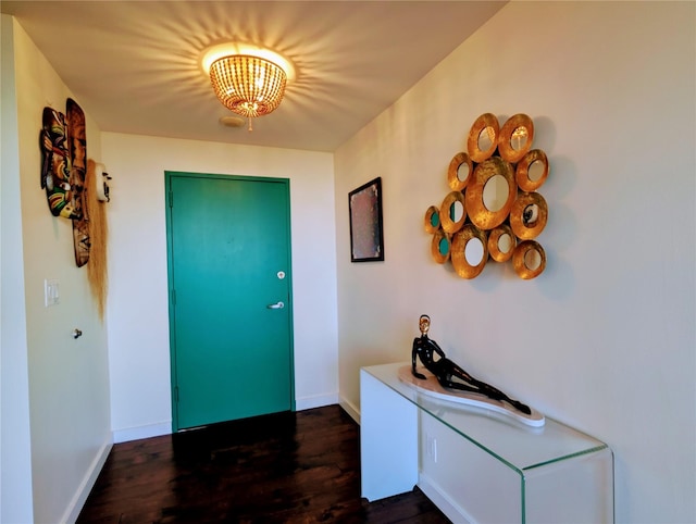 doorway to outside featuring dark hardwood / wood-style flooring