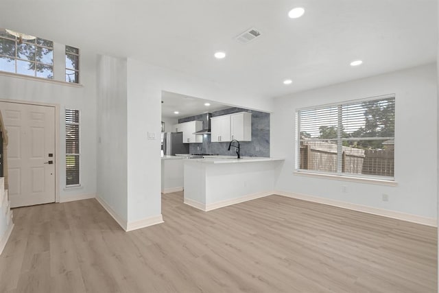 interior space featuring light hardwood / wood-style floors and sink