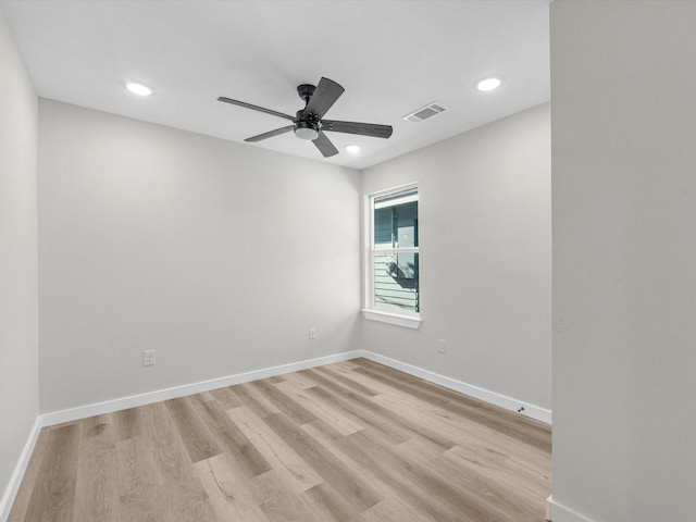 unfurnished room featuring light hardwood / wood-style floors and ceiling fan