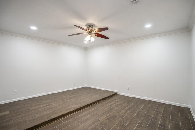 spare room featuring ceiling fan and crown molding