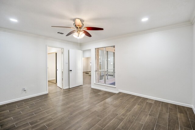 spare room with ceiling fan and crown molding