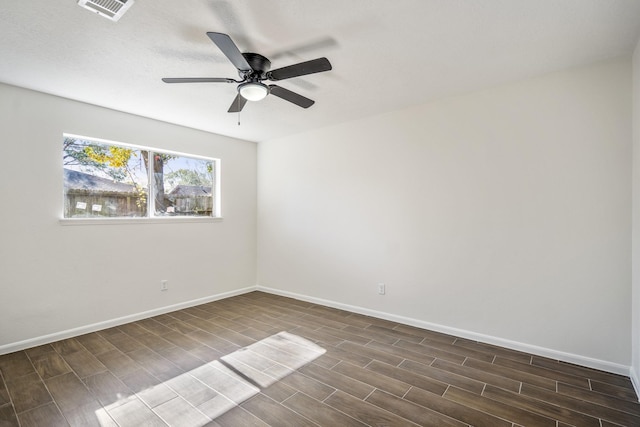 spare room with ceiling fan