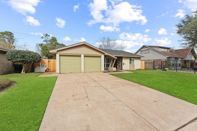 ranch-style home with a front yard and a garage