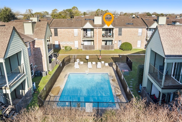 view of pool featuring central AC unit