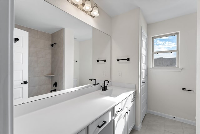 bathroom with vanity and tile patterned floors