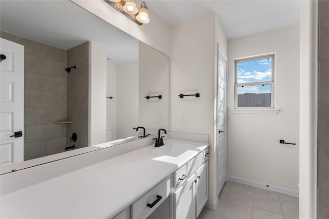 bathroom featuring tile patterned floors and vanity