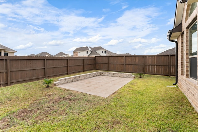 view of yard with a patio area