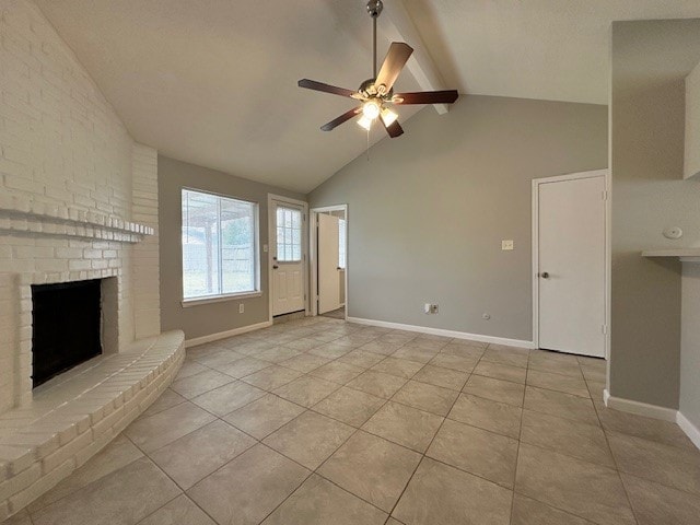 unfurnished living room featuring ceiling fan, light tile patterned floors, a brick fireplace, and lofted ceiling with beams