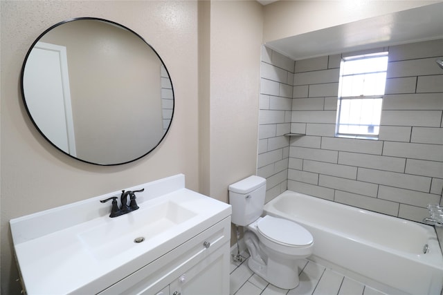 full bathroom with toilet, vanity, tiled shower / bath combo, and tile patterned floors