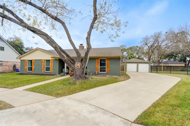 ranch-style house with a garage, a front lawn, and an outdoor structure