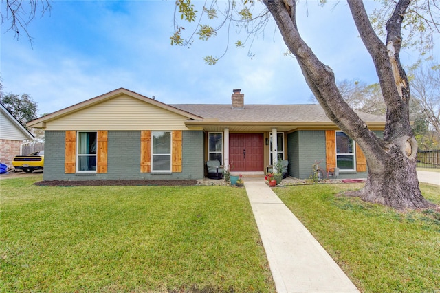 ranch-style home with a front yard