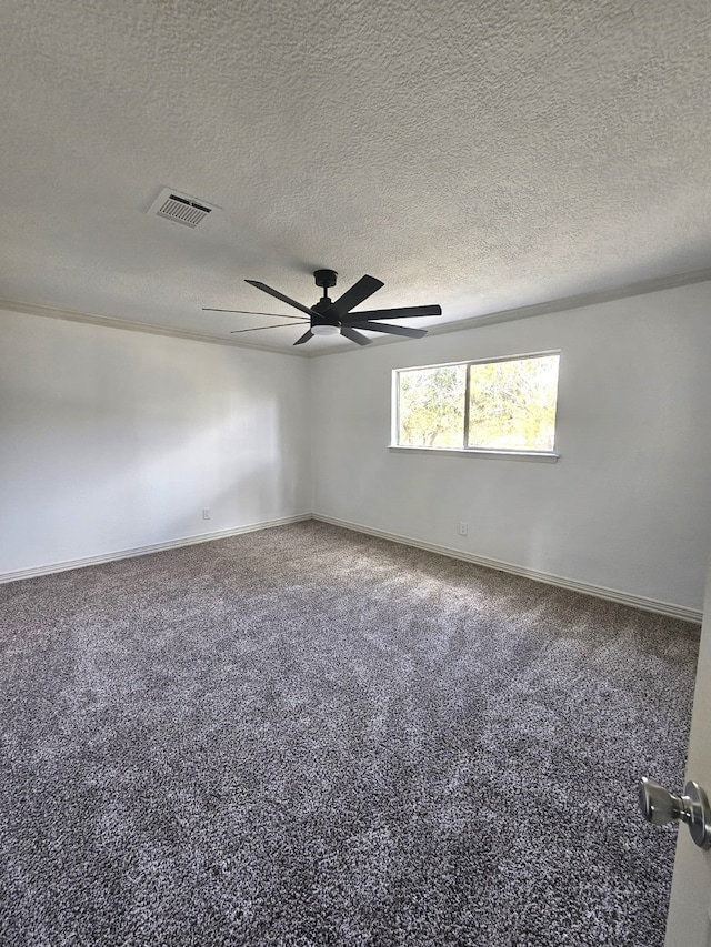 empty room featuring a textured ceiling and ceiling fan