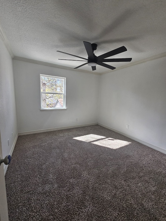 empty room featuring carpet floors, ceiling fan, crown molding, and a textured ceiling