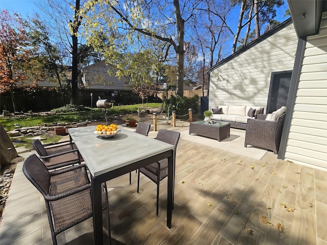 wooden deck featuring an outdoor hangout area