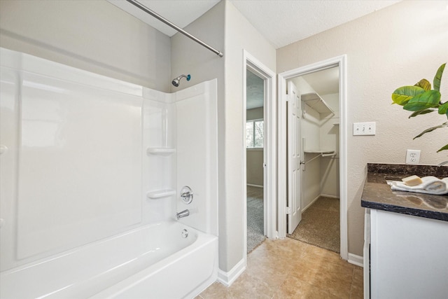 bathroom featuring shower / bathing tub combination and vanity