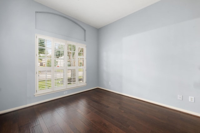 empty room with hardwood / wood-style floors