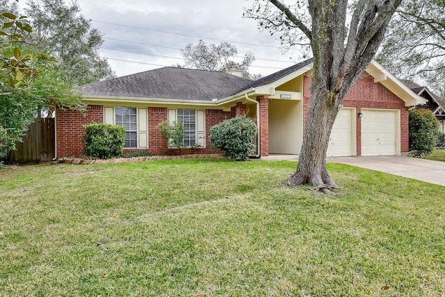 ranch-style home with a garage and a front yard