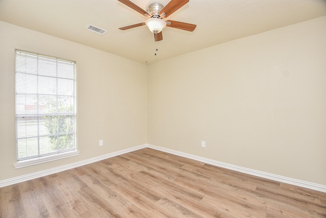 unfurnished room featuring ceiling fan and light hardwood / wood-style floors