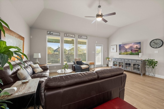 living room with ceiling fan, light hardwood / wood-style flooring, and vaulted ceiling