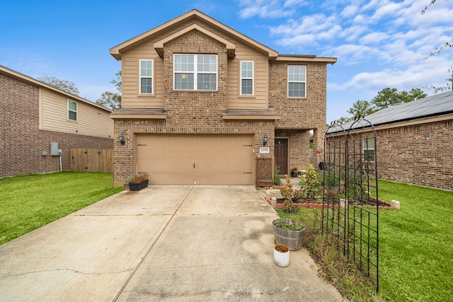 view of front facade with a garage and a front yard