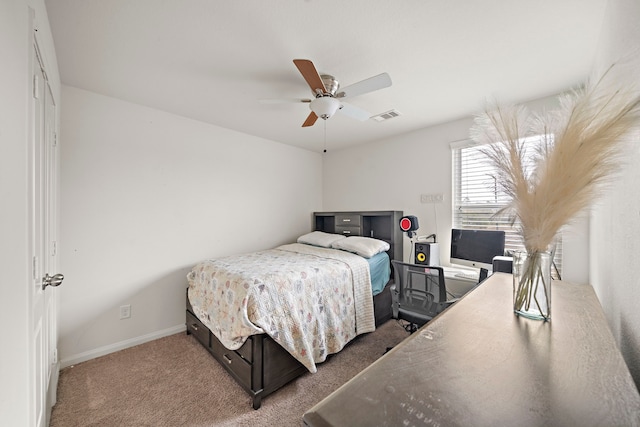 bedroom featuring ceiling fan and carpet flooring