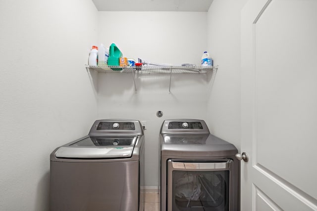 laundry room featuring washing machine and dryer