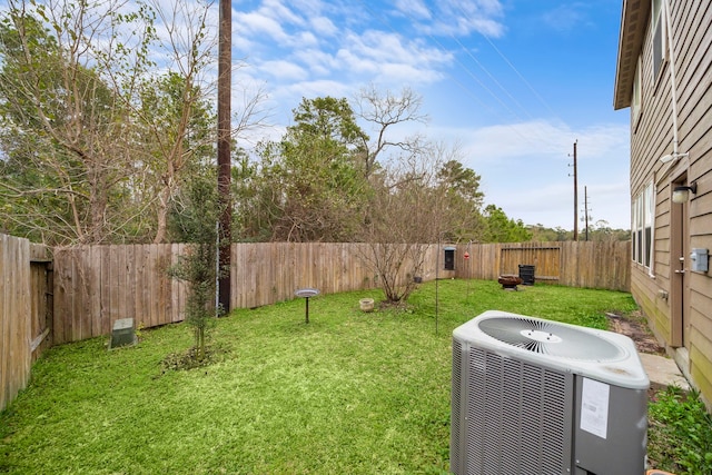 view of yard with central AC