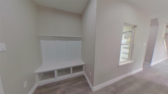 mudroom with light hardwood / wood-style flooring