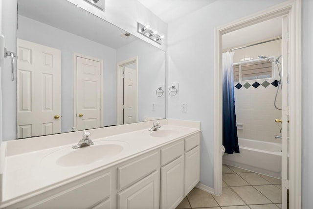 full bathroom with tile patterned floors, vanity, toilet, and shower / bath combination with curtain