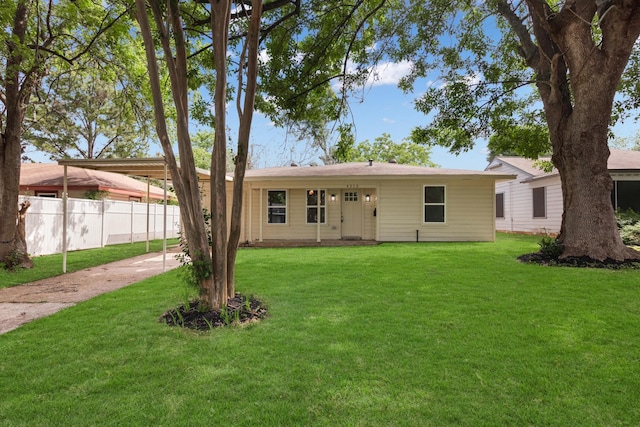 single story home with a carport and a front yard