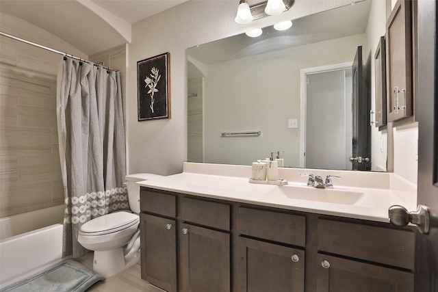 full bathroom featuring toilet, vanity, and shower / tub combo with curtain