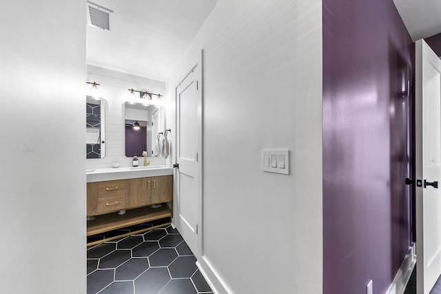 bathroom featuring vanity and tile patterned flooring