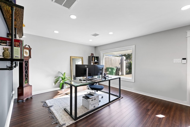 office with dark hardwood / wood-style floors