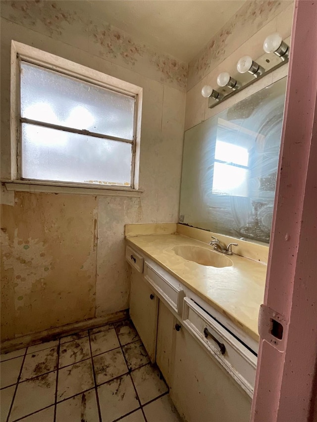 bathroom with a wealth of natural light and vanity