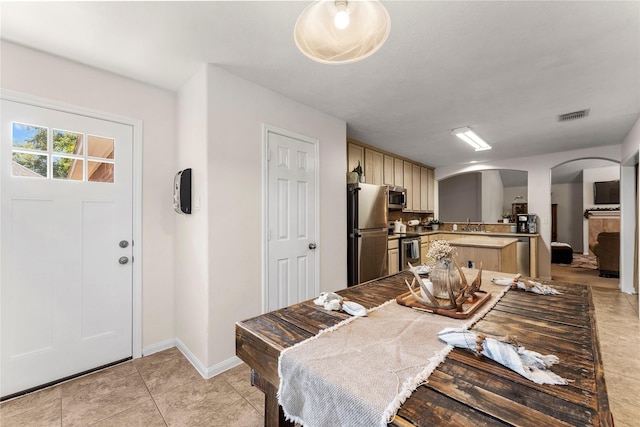 view of tiled dining space