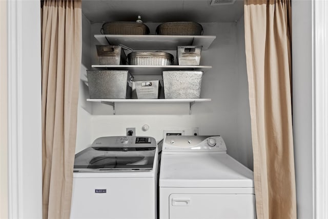 laundry room featuring washer and dryer