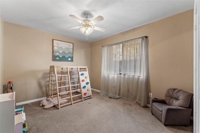 bedroom with ceiling fan and carpet flooring