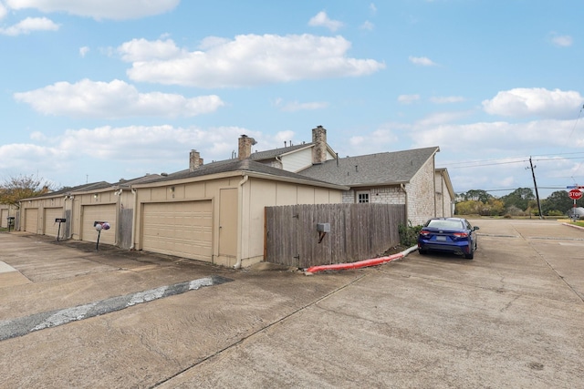 view of home's exterior with a garage