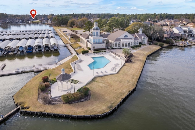 birds eye view of property featuring a water view