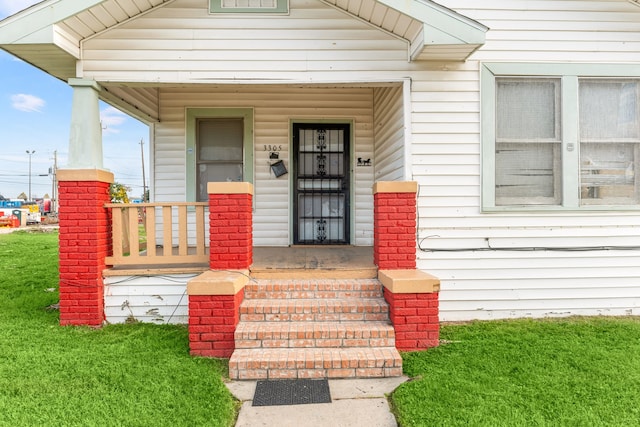 entrance to property with a porch