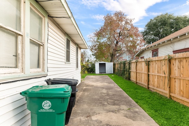 view of patio with a shed