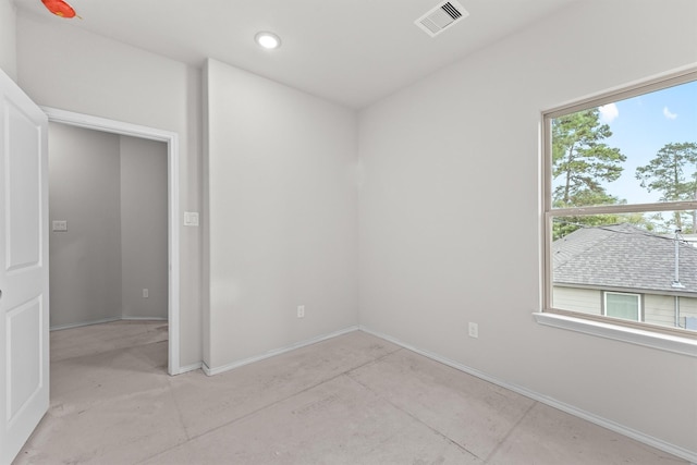 spare room with a wealth of natural light