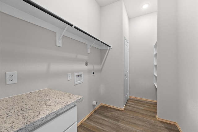 clothes washing area featuring hookup for a gas dryer, dark hardwood / wood-style floors, hookup for a washing machine, and electric dryer hookup