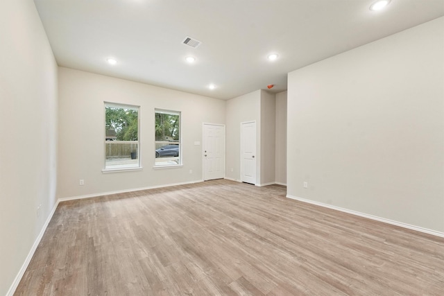 unfurnished room featuring light hardwood / wood-style flooring