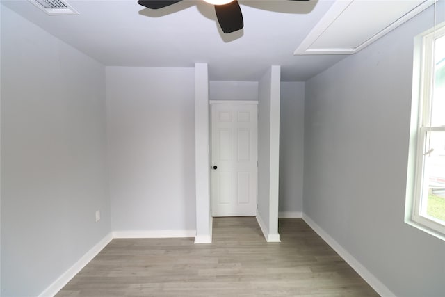 unfurnished bedroom featuring ceiling fan and light wood-type flooring