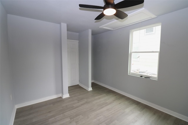 unfurnished bedroom featuring ceiling fan and light wood-type flooring