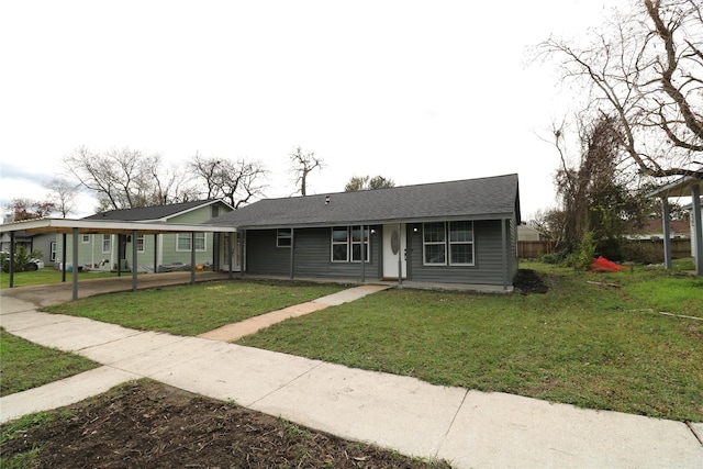 ranch-style home featuring a front lawn