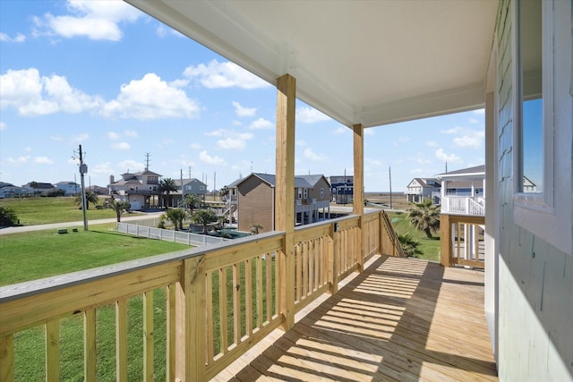 deck featuring a lawn