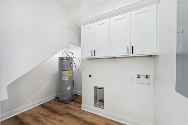 clothes washing area featuring water heater, electric dryer hookup, cabinets, dark hardwood / wood-style floors, and washer hookup